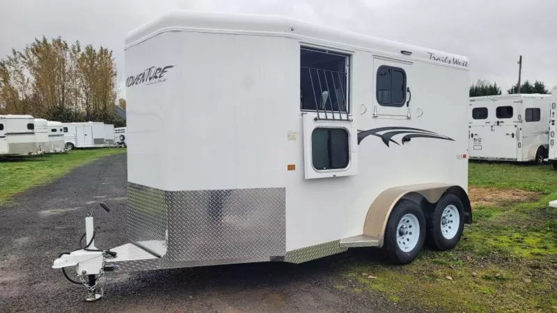 2026 2 horse Trails West Adventure MX II 2 Horse Trailer - Swing out saddle